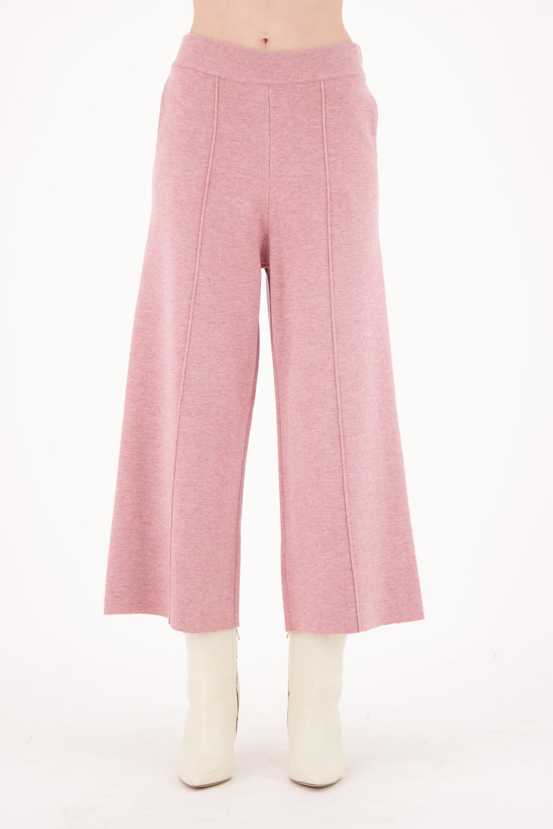 Pink wide-leg pants on a white background
