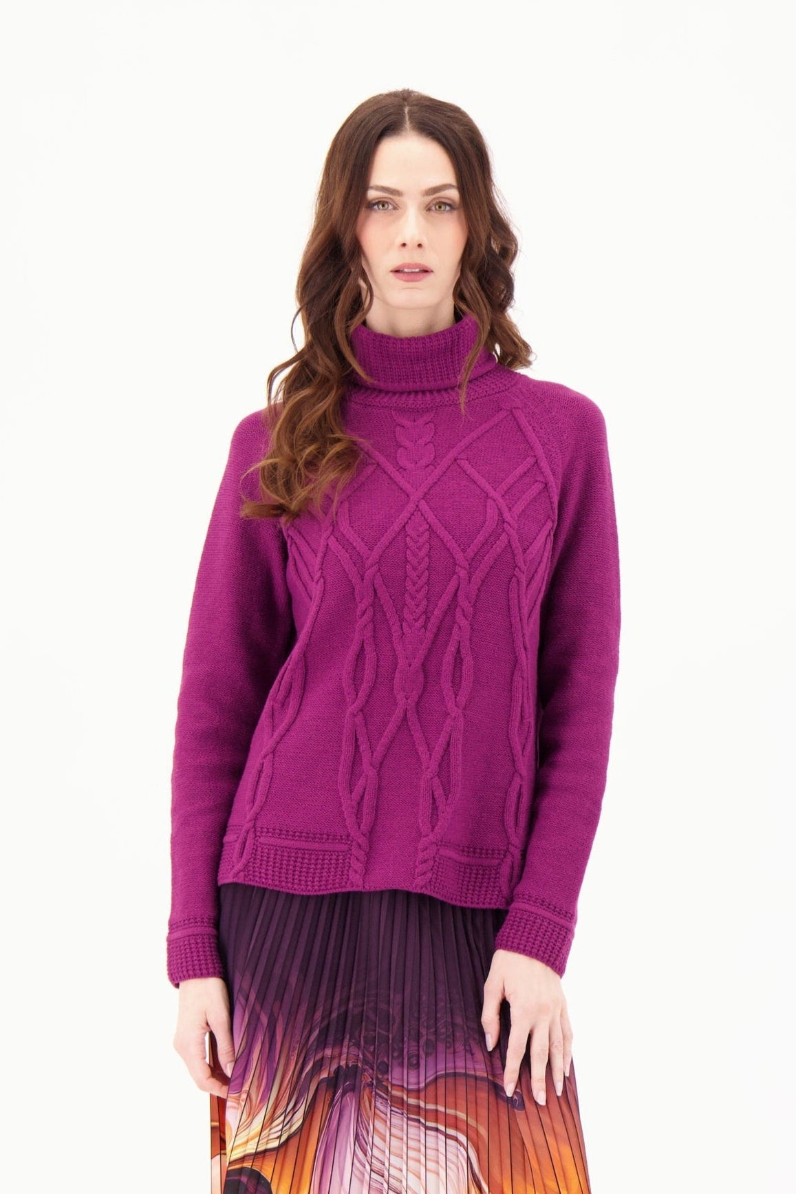 Woman wearing a purple sweater on a white background