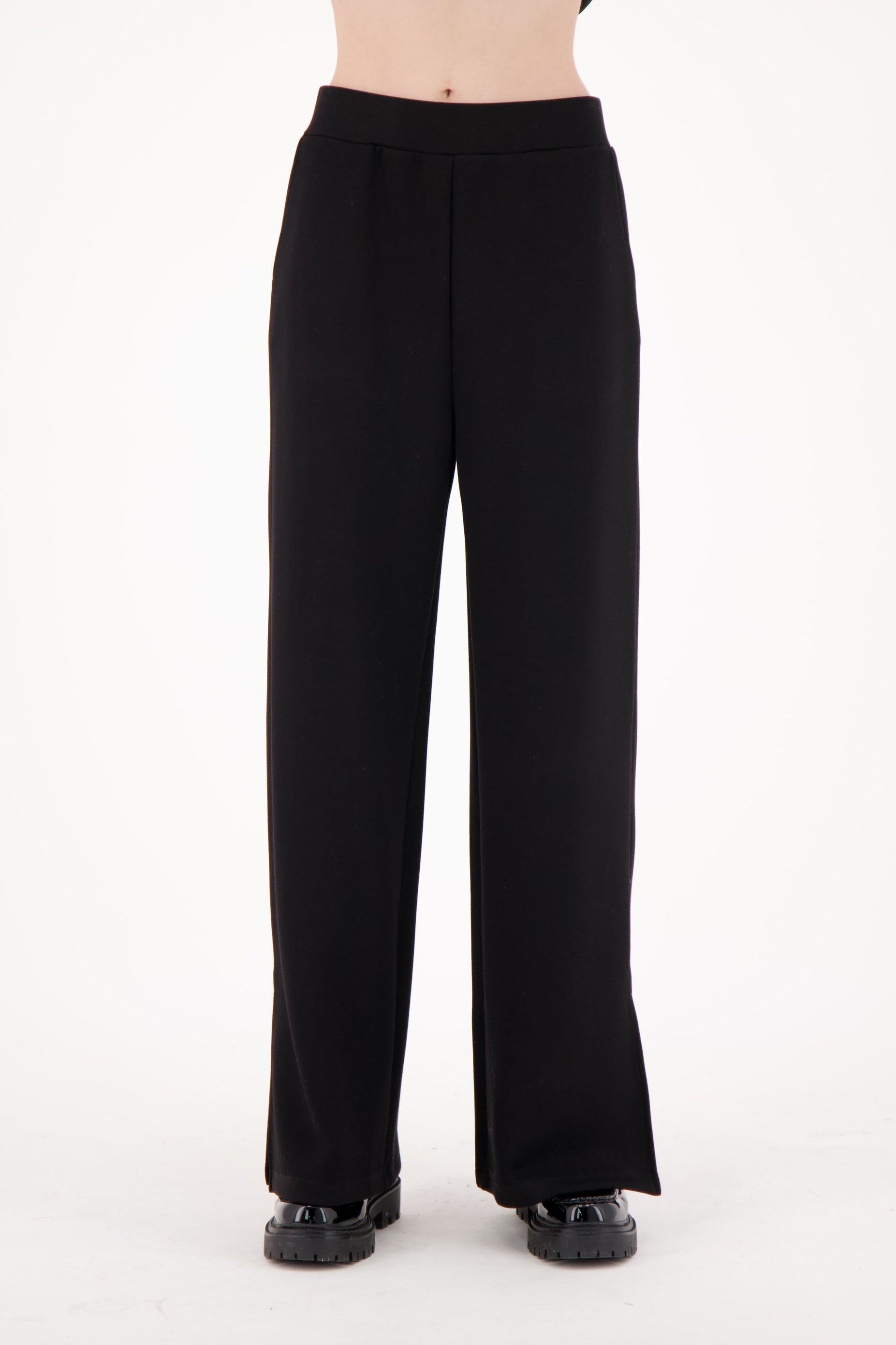 Black wide-leg pants on a white background