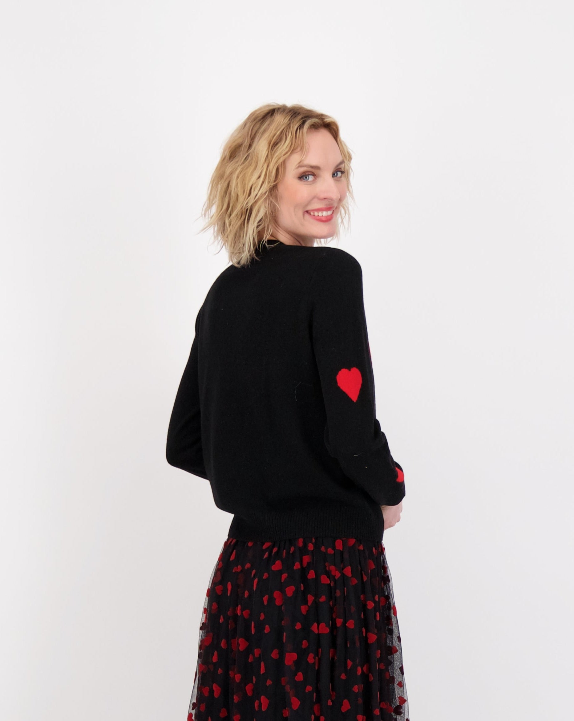 Black sweater with hearts best sale